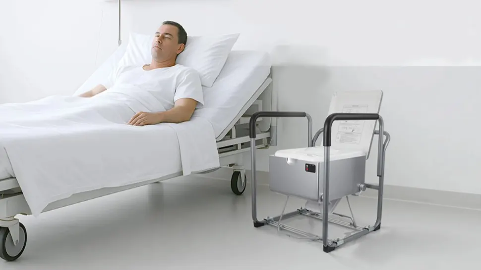 Portable toilet with handrails for the elderly