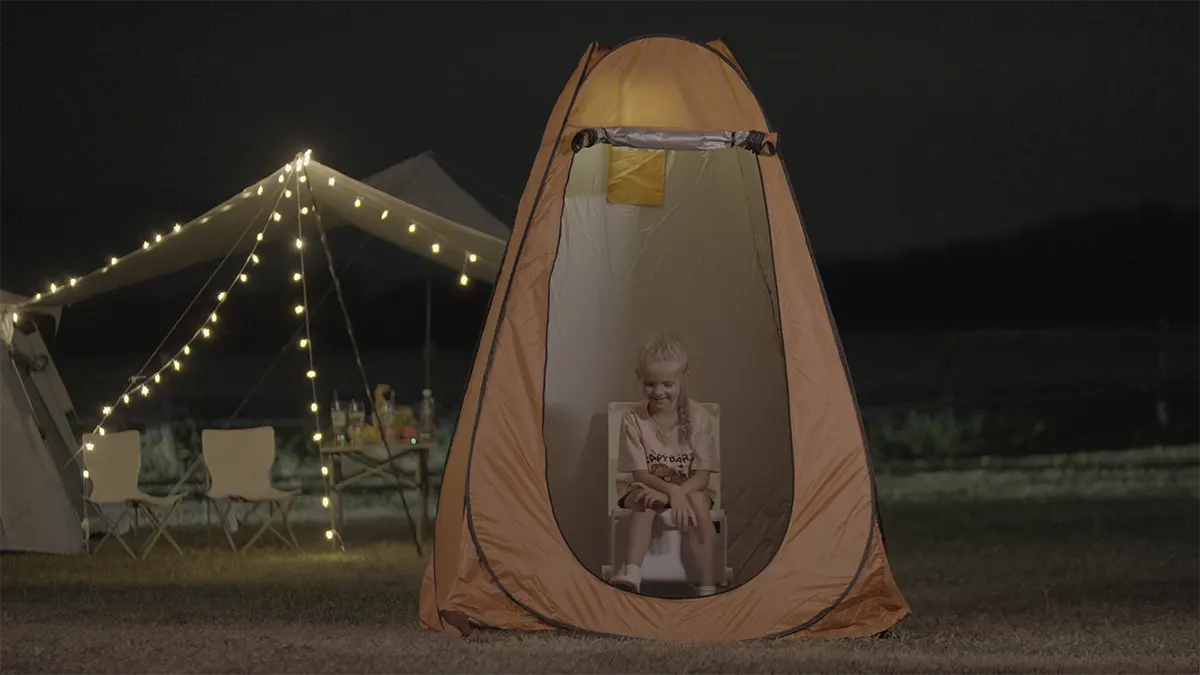Using the Modiwell portable toilet in a tent